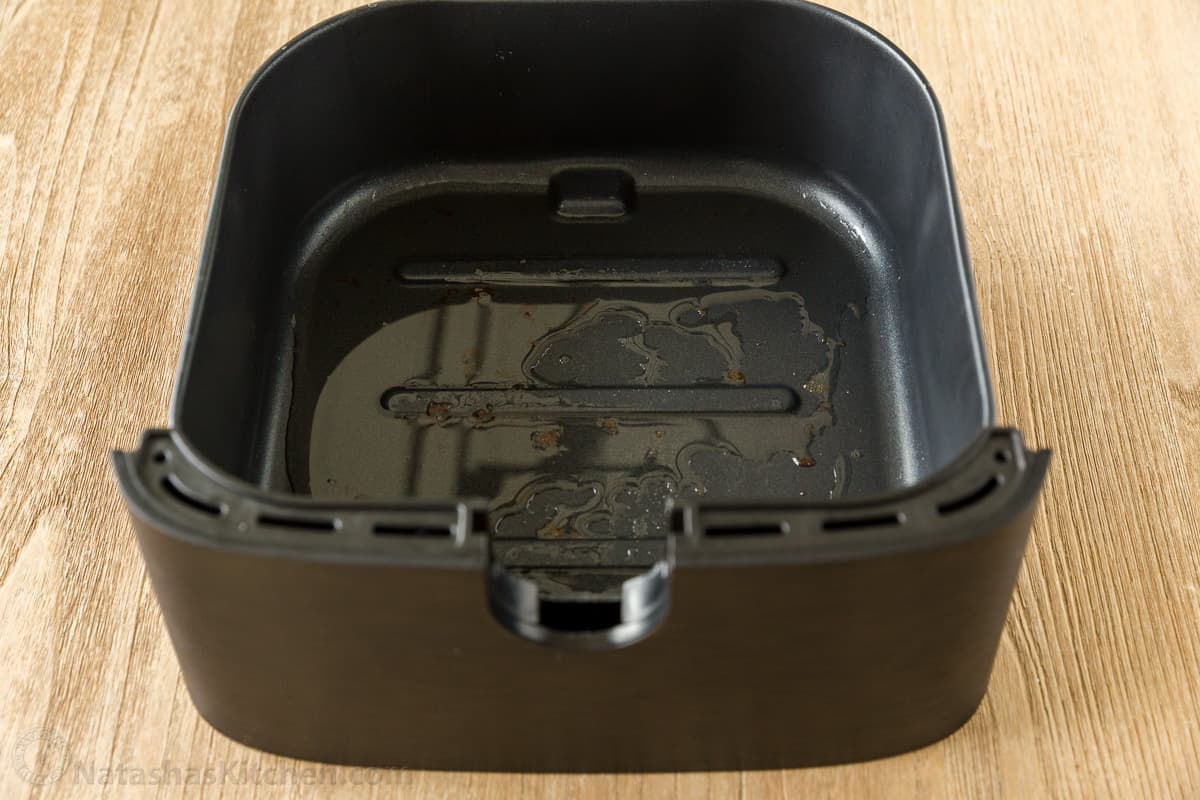 Oil in air fryer drip pan