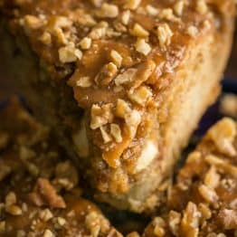 Apple coffee cake (classic apple dapple cake) is loaded with apple and walnuts. The caramel sauce creates a moist, buttery center. Easy apple coffee cake! | natashaskitchen.com