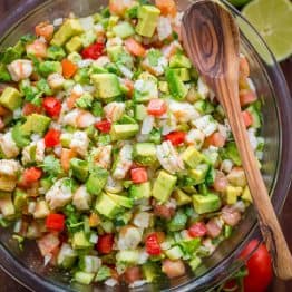 This Avocado Shrimp Salsa is a party favorite! Loaded with shrimp, avocado and a surprising ingredient! Easy, excellent avocado shrimp salsa video recipe. | natashaskitchen.com