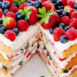 Berry Tiramisu Cake with slice cut out