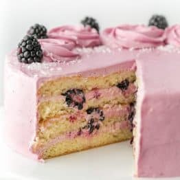 Soft and moist blackberry cake with fluffy blackberry lemon buttercream frosting. This blackberry lemon cake is sweet and tart with plenty of juicy berries!