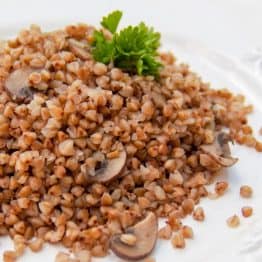 A plate of buckwheat with mushrooms