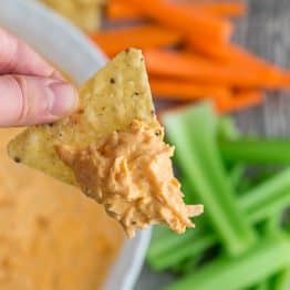 buffalo chicken dip on a tortilla chip