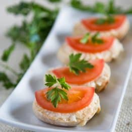 These Gouda and Tomato Tea Sandwiches (crostini) are really easy to throw together. The spread keeps well in the fridge so you can make it ahead of time.