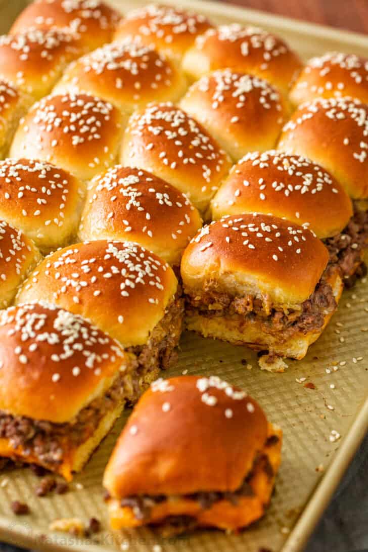 Cheeseburger Sliders are juicy, cheesy and beefy and everything we love about burgers. Sliders are quick and easy, make-ahead, and reheat really well. Sliders made ahead on a baking sheet