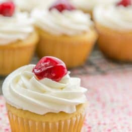 The cherry surprise in these Honey Cupcakes makes me ridiculously happy. This recipe yields 24 cupcakes. The softest honey cupcakes!