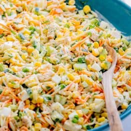 This chicken pasta salad is loaded, hearty and satisfying. The creamy lemon dill dressing adds fresh amazing flavor. This pasta salad is so tasty! | natashaskitchen.com