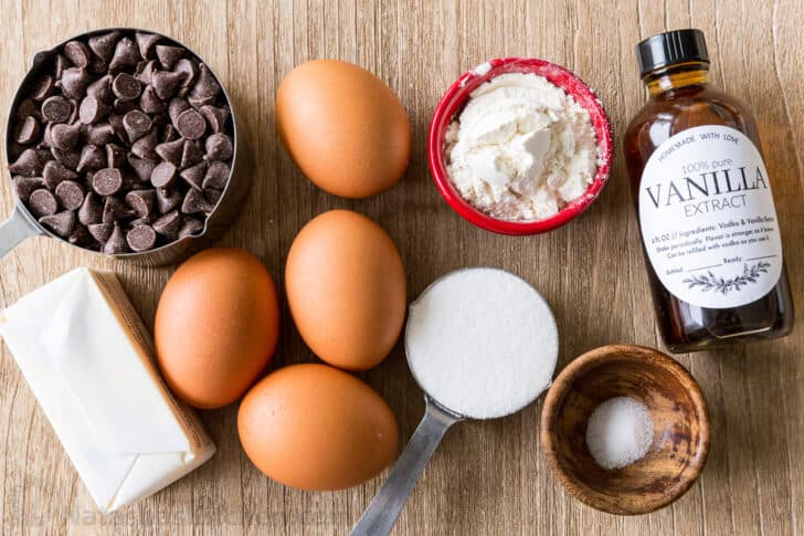 Ingredients for molten chocolate lava cake with chocolate chips, eggs, butter, sugar, salt, flour and vanilla extract