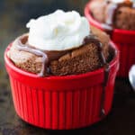 Chocolate Souffle topped with chocolate sauce and whipped cream