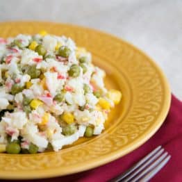 Crab salad on a yellow plate
