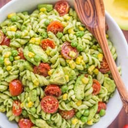 The secret ingredient in this Creamy Avocado Pasta Salad recipe will impress you! This avocado pasta salad is easy, creamy, vibrant, fresh and so satisfying! | natashaskitchen.com