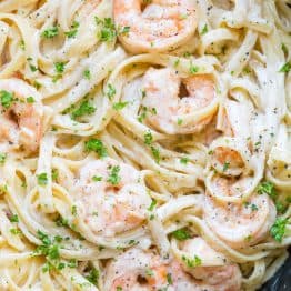 Creamy Shrimp Pasta reminds me of my favorite dish at Olive Garden with plump juicy shrimp and the easiest alfredo sauce. Rave reviews on this shrimp pasta! | natashaskitchen.com