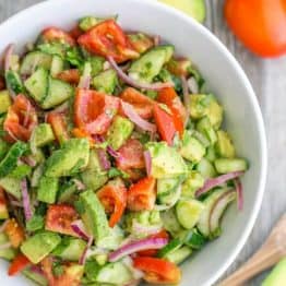 This Cucumber Tomato Avocado Salad recipe is a keeper! Easy, Excellent Salad | natashaskitchen.com