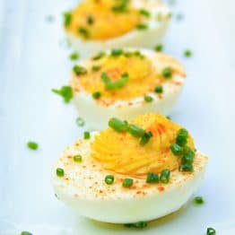 These dressed eggs are super easy to make! If you have way too many Easter eggs in your fridge, this stuffed eggs recipe is for you.