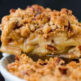 Slice of dutch apple pie with crumb topping