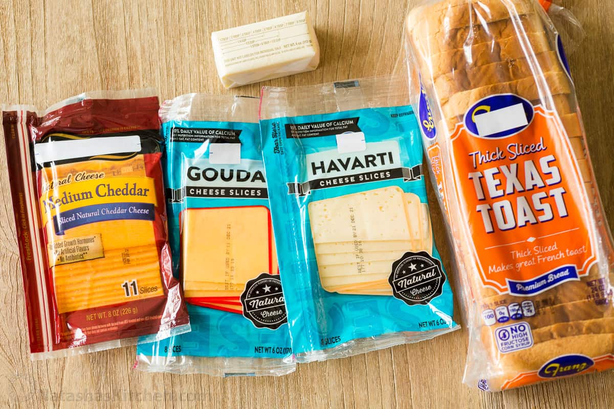 Learn how to make the best Grilled Cheese sandwich with a crisp, buttery exterior and gooey cheese center. Make grilled cheese like a pro! Ingredients for making grilled cheese with bread, sliced cheese and butter