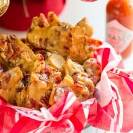 This Candied Bacon Brittle is loaded with nuts and candied bacon. It's unusual but CRAZY GOOD! Candied Bacon Brittle is a wonderful homemade gift idea! | natashaskitchen.com