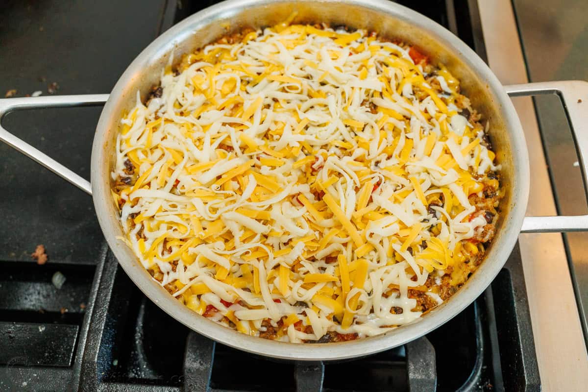 Mexican Ground Beef and Rice Skillet topped with shredded Mexican cheese blend