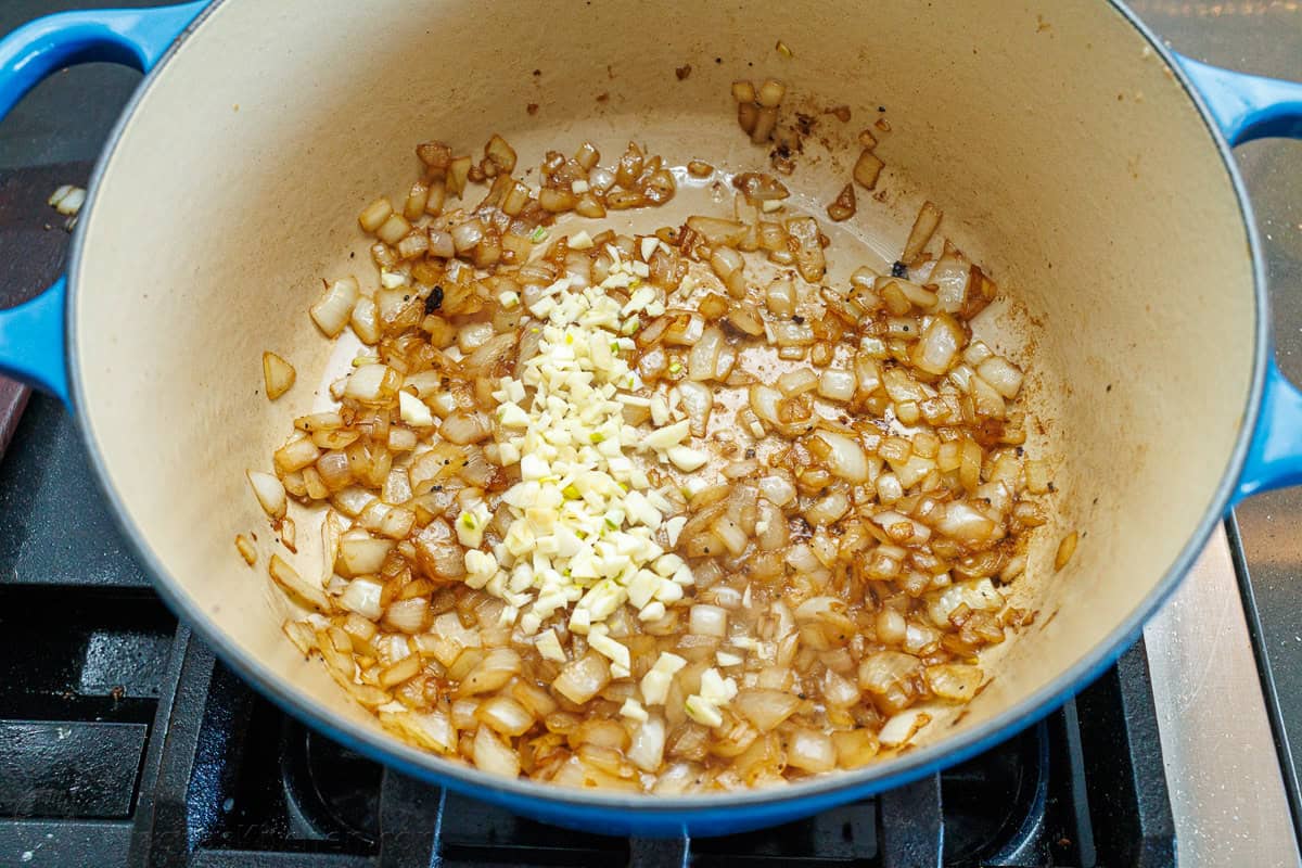 This is the best Pot Roast Recipe to get amazingly tender beef with a savory and satisfying sauce. It will become your go-to comfort recipe! Onions and garlic sauteed in a large dutch oven