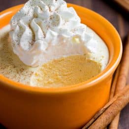 Pumpkin mousse cups have the taste and texture of whipped pumpkin pie. Smooth and airy pumpkin mousse recipe with the best rum-infused whipped cream! | natashaskitchen.com