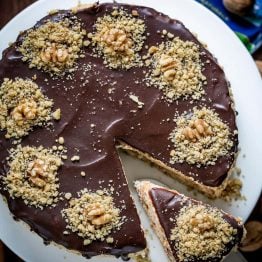 Royal Walnut Cake is beautiful and delicious! The Russian buttercream frosting will surprise you. Everything about this walnut cake is good! (Video Recipe) YOU CAN DO THIS! | natashaskitchen.com