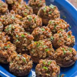 Sausage Stuffed Mushrooms are crunchy on top with a creamy and juicy center. They are loaded with flavor and really stand out as a holiday party appetizer. | natashaskitchen.com