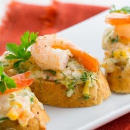 These shrimp and cheese canapes are a keeper; uber delicious and so easy to make. The shrimp spread on these tea sandwiches is perfect.