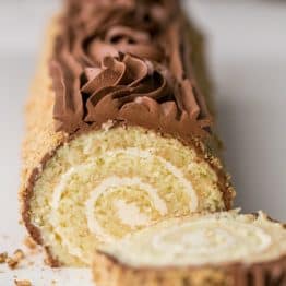You have to try this cake roll! Moist, chocolatey & stunning. Step-by-step photos! @natashaskitchen