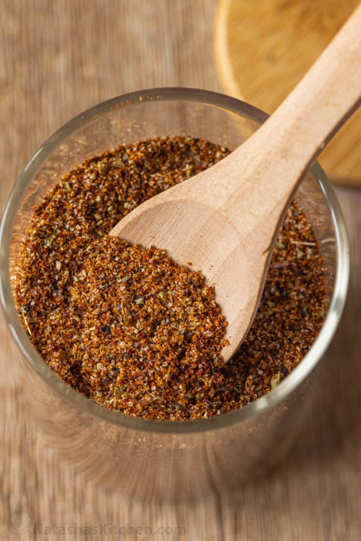 This easy homemade taco seasoning takes minutes to make, and it's tastier, healthier, and cheaper than the store-bought packets. Wooden spoon in jar of taco seasoning