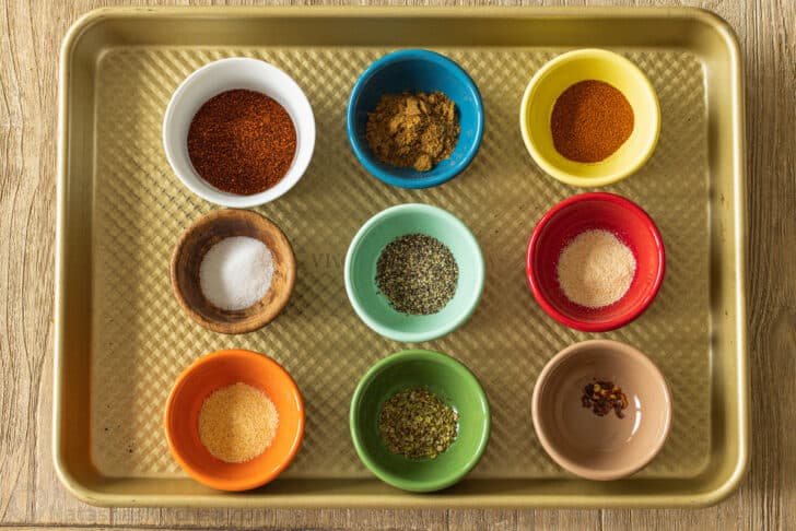 This easy homemade taco seasoning takes minutes to make, and it's tastier, healthier, and cheaper than the store-bought packets. Overhead view of spices for making DIY Taco Seasoning