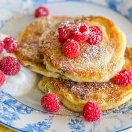 You must try these simple yet delicious Ukrainian syrniki with Farmer's cheese. They known as tvorog pancakes. Soft on the inside, golden outside. Yum!