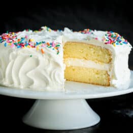 Vanilla Cake Recipe with cut slice